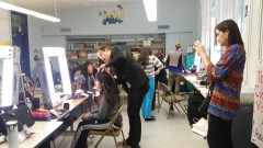 Classroom transformed into a makeup studio.